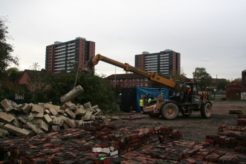 Carl from Galliford Try helping to lay out the facade stones, 22 Oct